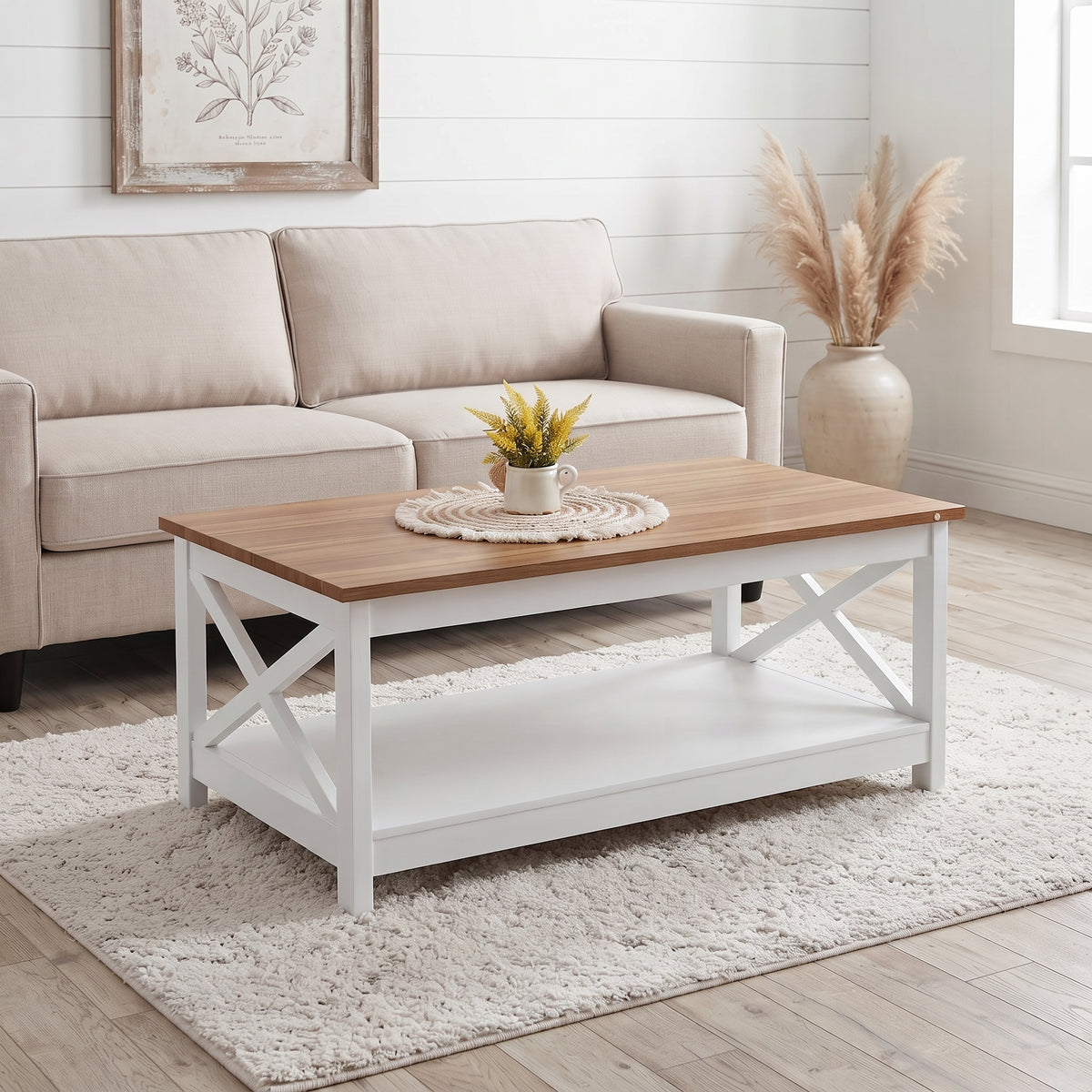 Mesa de centro blanca Vittoria frente a un sofá beige